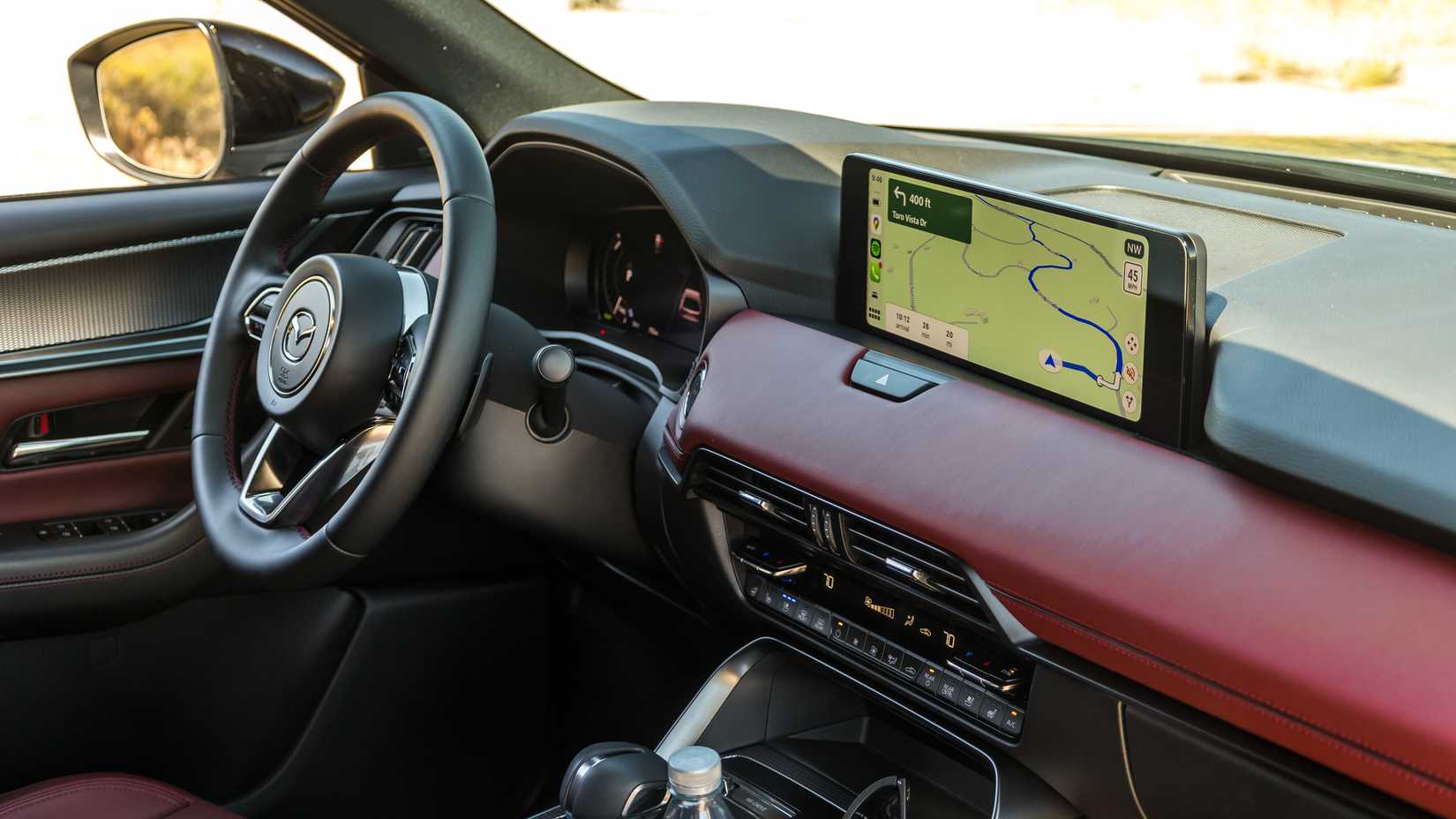 Close-up shot of the dashboard inside the cabin of a 2025 Mazda CX-70.