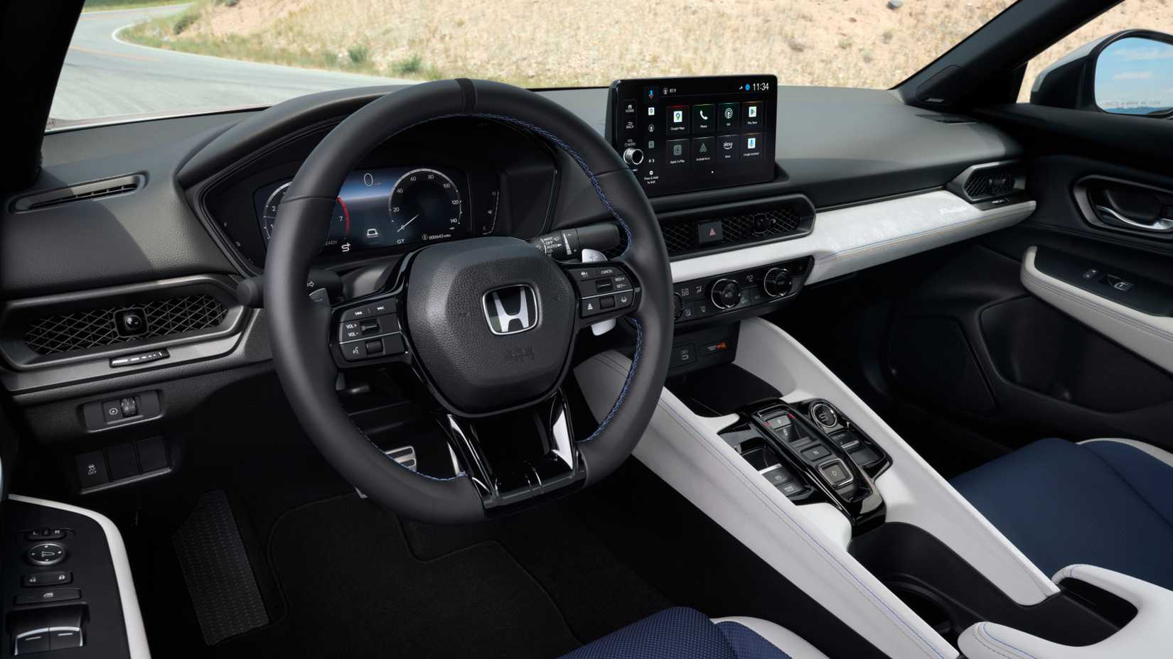 Gros plan de la direction à l’intérieur de l’habitacle d’une Honda Prelude hybride 2026.