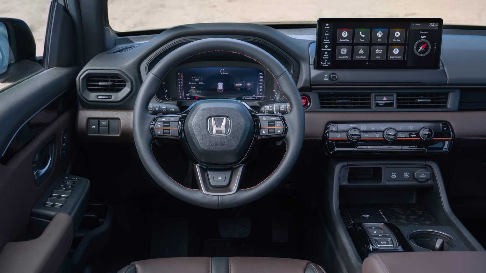 Shot inside the cabin of a 2026 Honda Pilot TrailSport, showing the interior and dashboard.