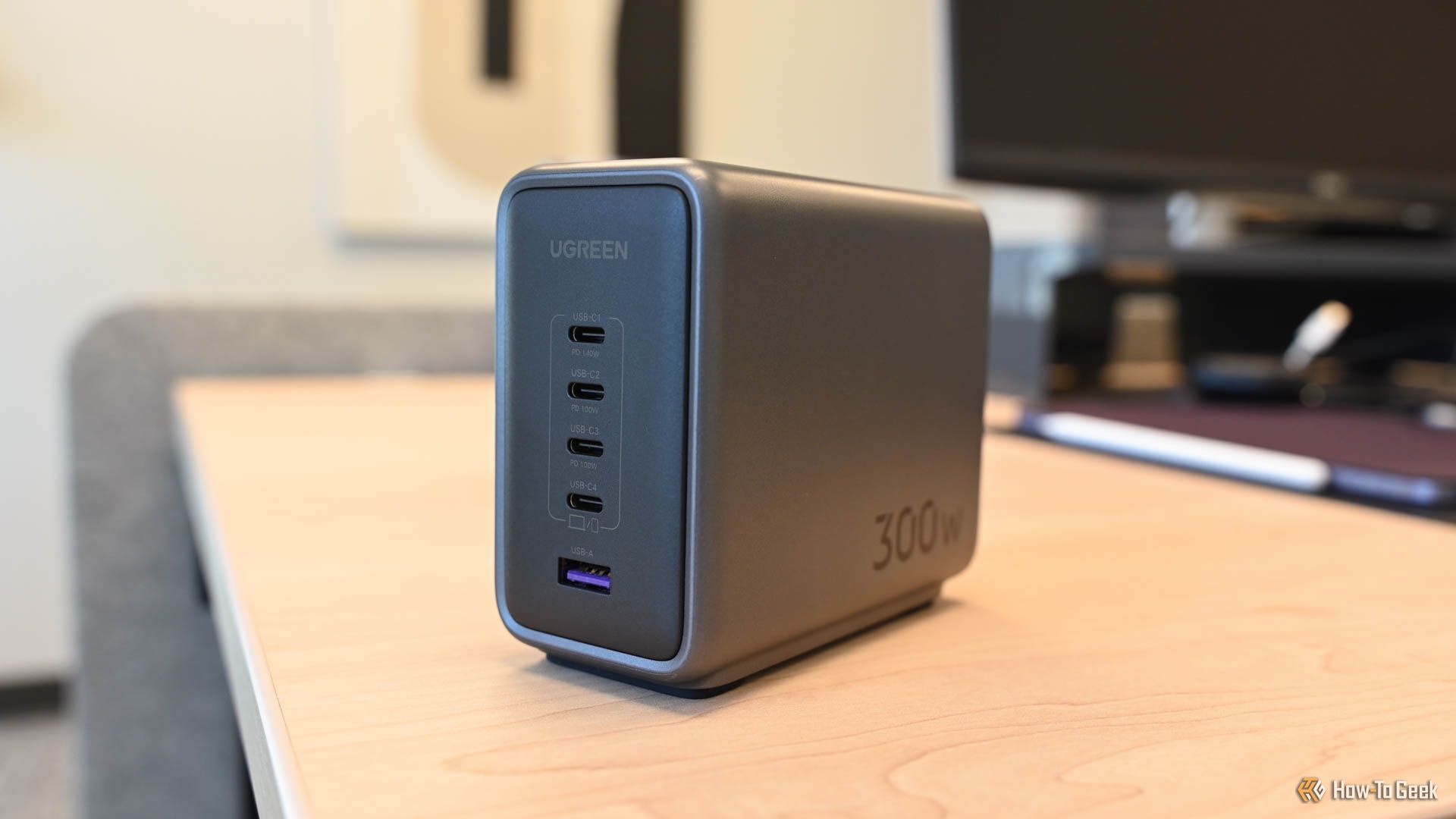 An angled view of the UGreen Nexode 300W GaN Desktop Charger.