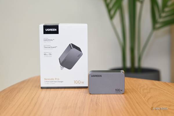 Ugreen Nexode Pro 100W USB C Wall Charger in front of its box