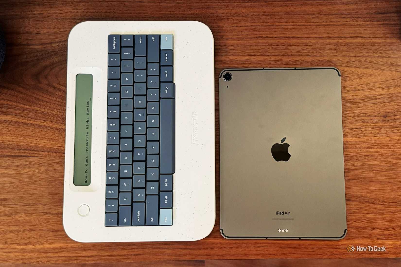 Freewrite Alpha on the left next to an iPad Air