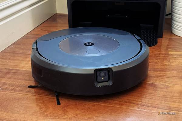 Roomba Combo j9+ vacuuming on hardwood floor