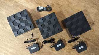 Top view of the contents of the Netgear Nighthawk MK93S mesh system.