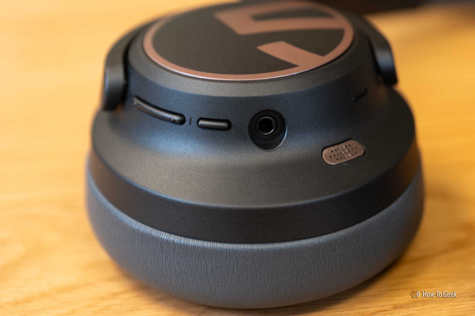 Close up on the power button, volume buttons and 3.5mm jack