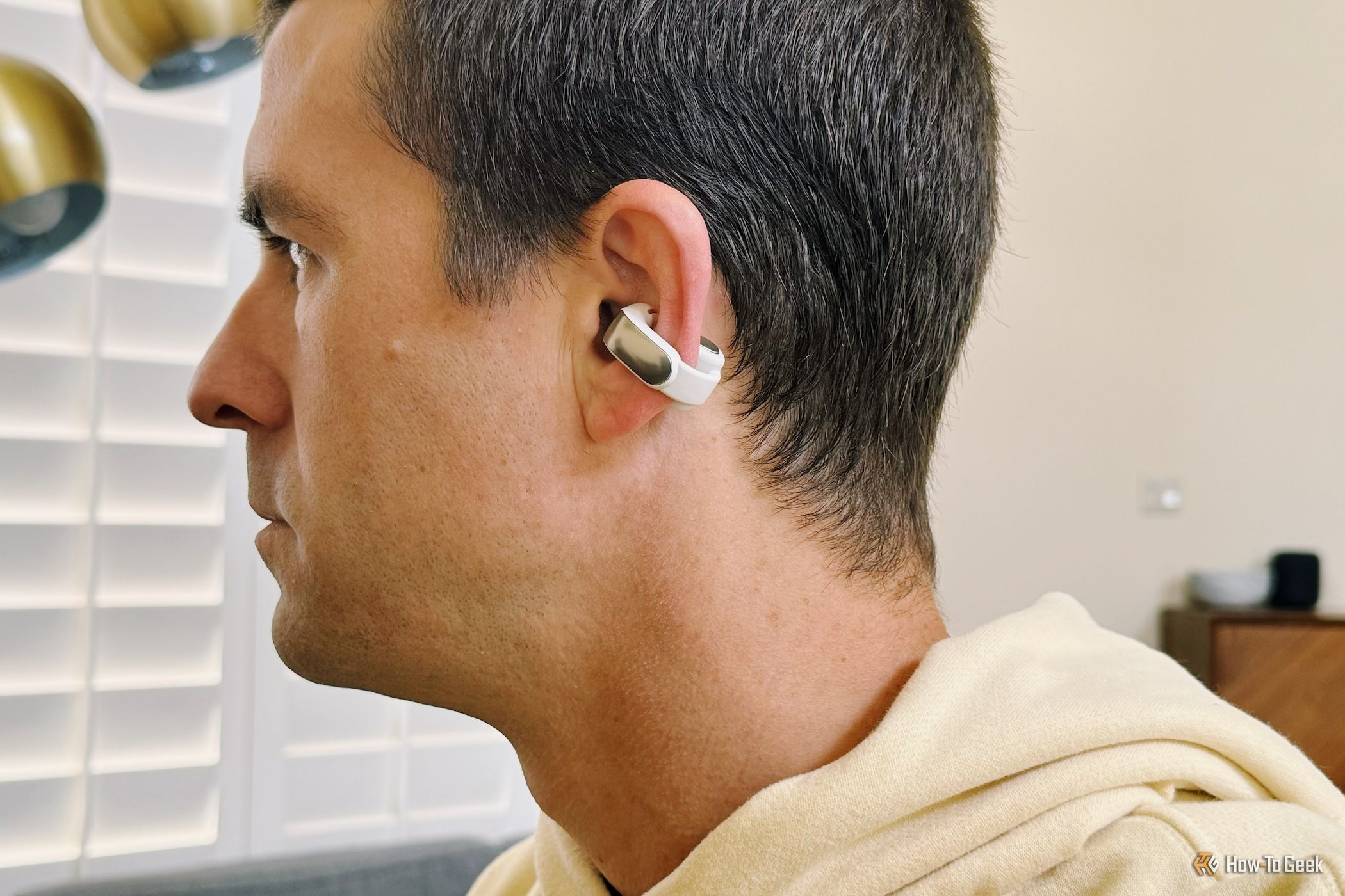 Person wearing SoundPEATS T3 Pro earbuds in active environment