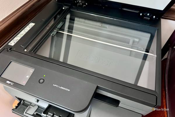 Brother MFC L2820DW XL open showing scanner.