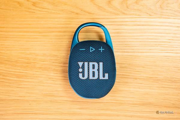A top-down view of the JBL Clip 5 on a table.