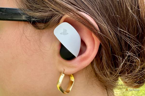 Sony Pulse Explore Wireless Earbud being worn in a person's left ear