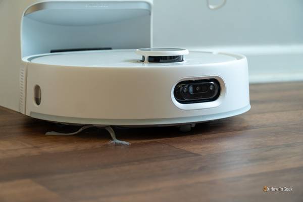 SwitchBot S10 Robot Vacuum Docked At Charging Station