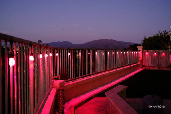 Nanoleaf Essentials Matter Outdoor String Lights at night in red