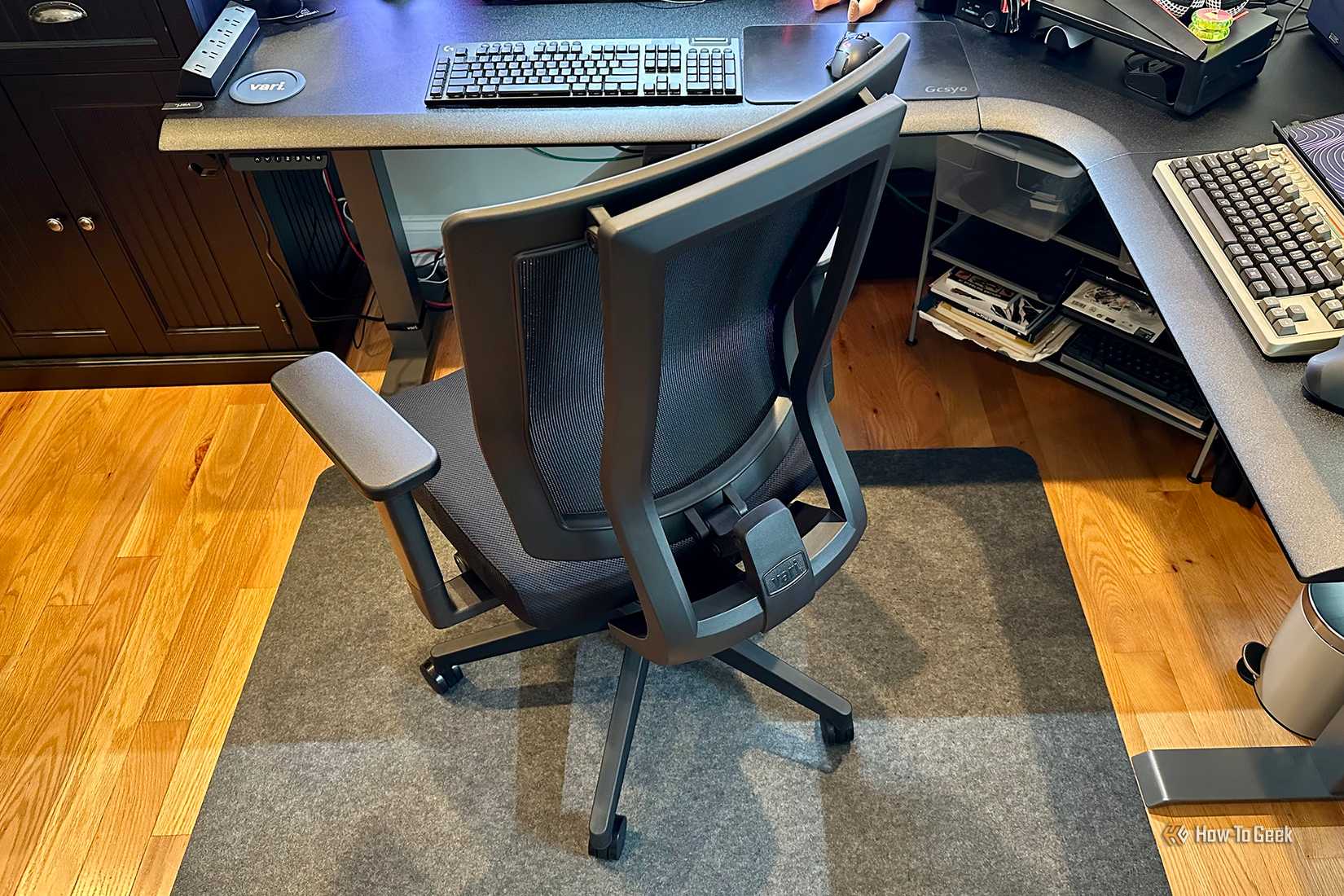 Vari Task Chair in front of Vari L-Shape Electric Standing Desk.