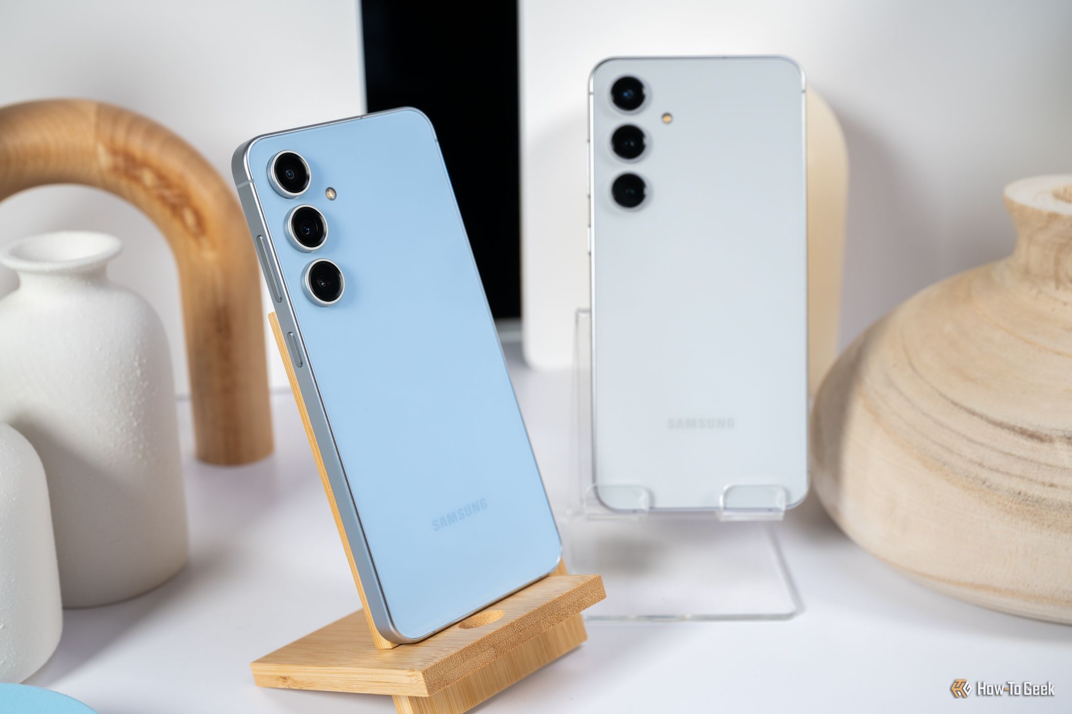 Samsung Galaxy S24 FE in blue and white placed on a table
