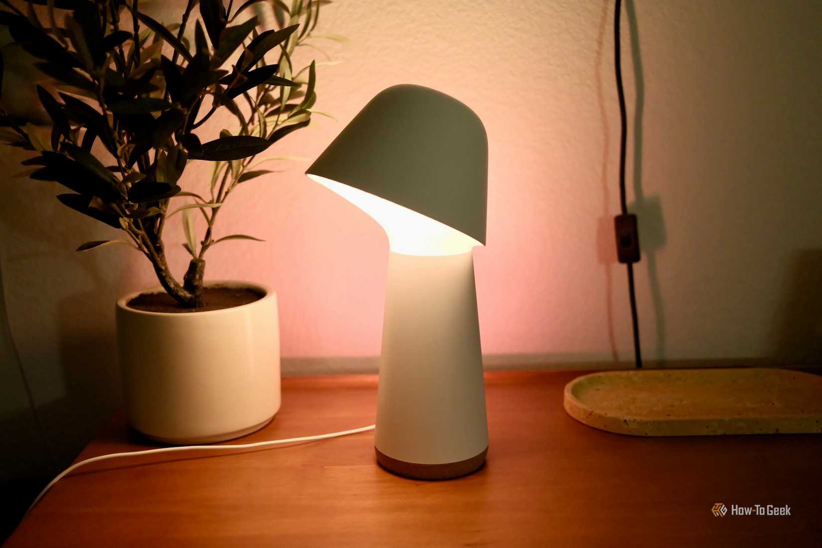 Philips Hue Twilight with a soft orange glow.