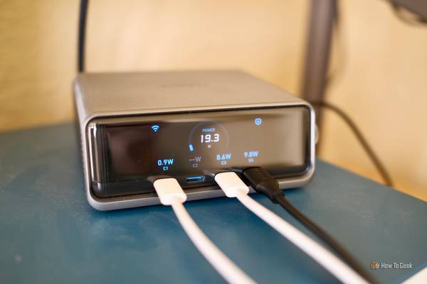 Anker Prime Charger 250W showing devices charging power on the screen