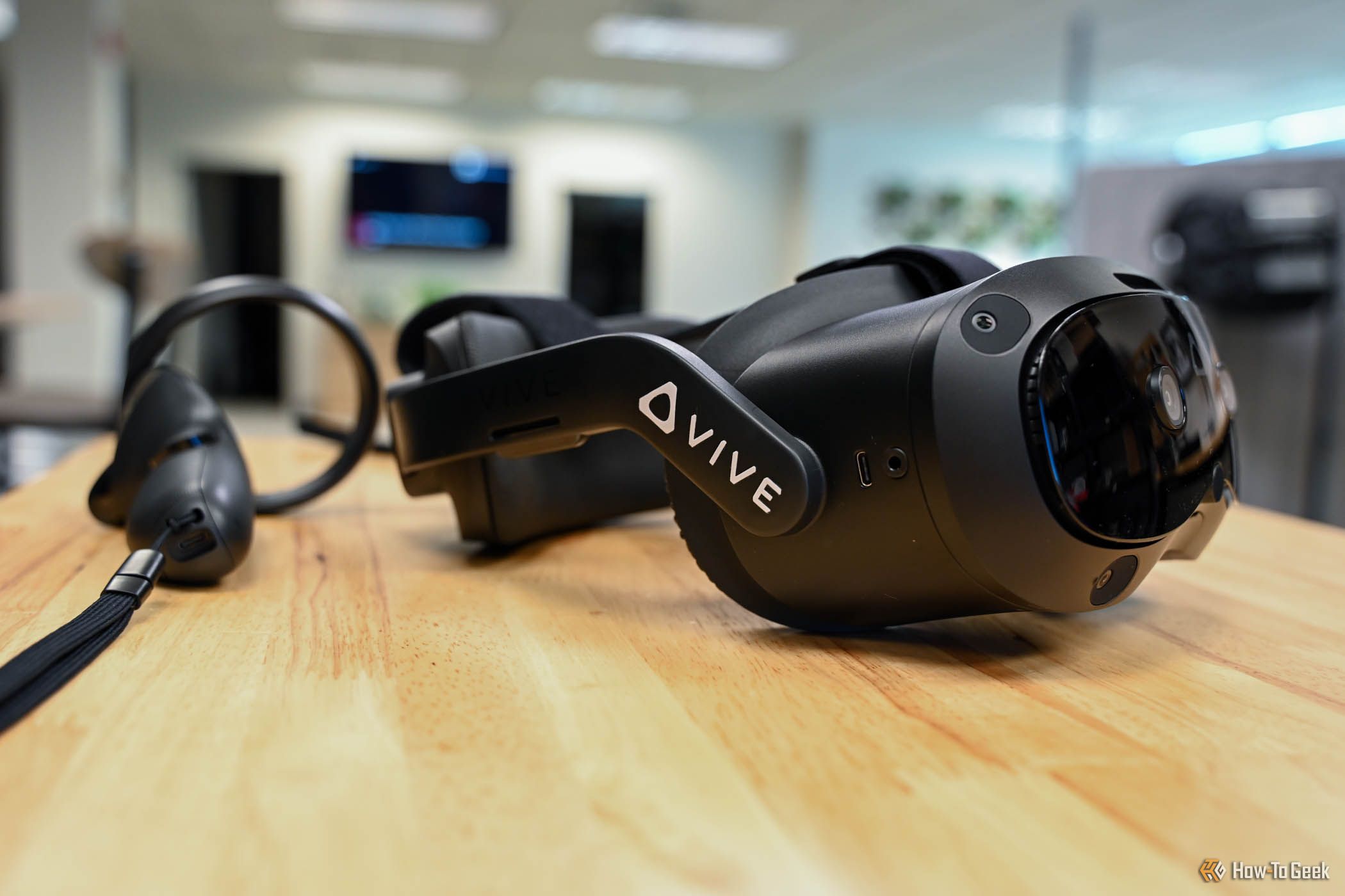 Controllers and headset of the HTC VIVE Focus Vision.