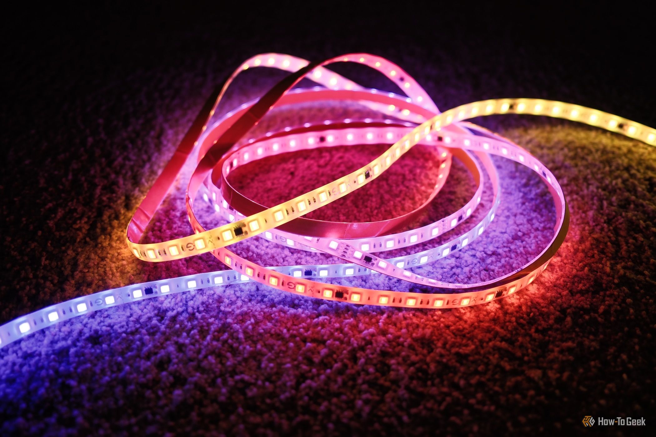 Govee Strip Light 2 Pro LED strip with multiple colors on the ground.