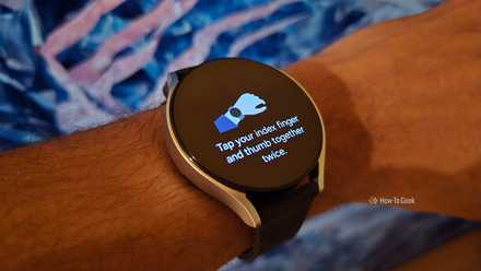 Instructions for double pinch gesture on Galaxy Watch 6.