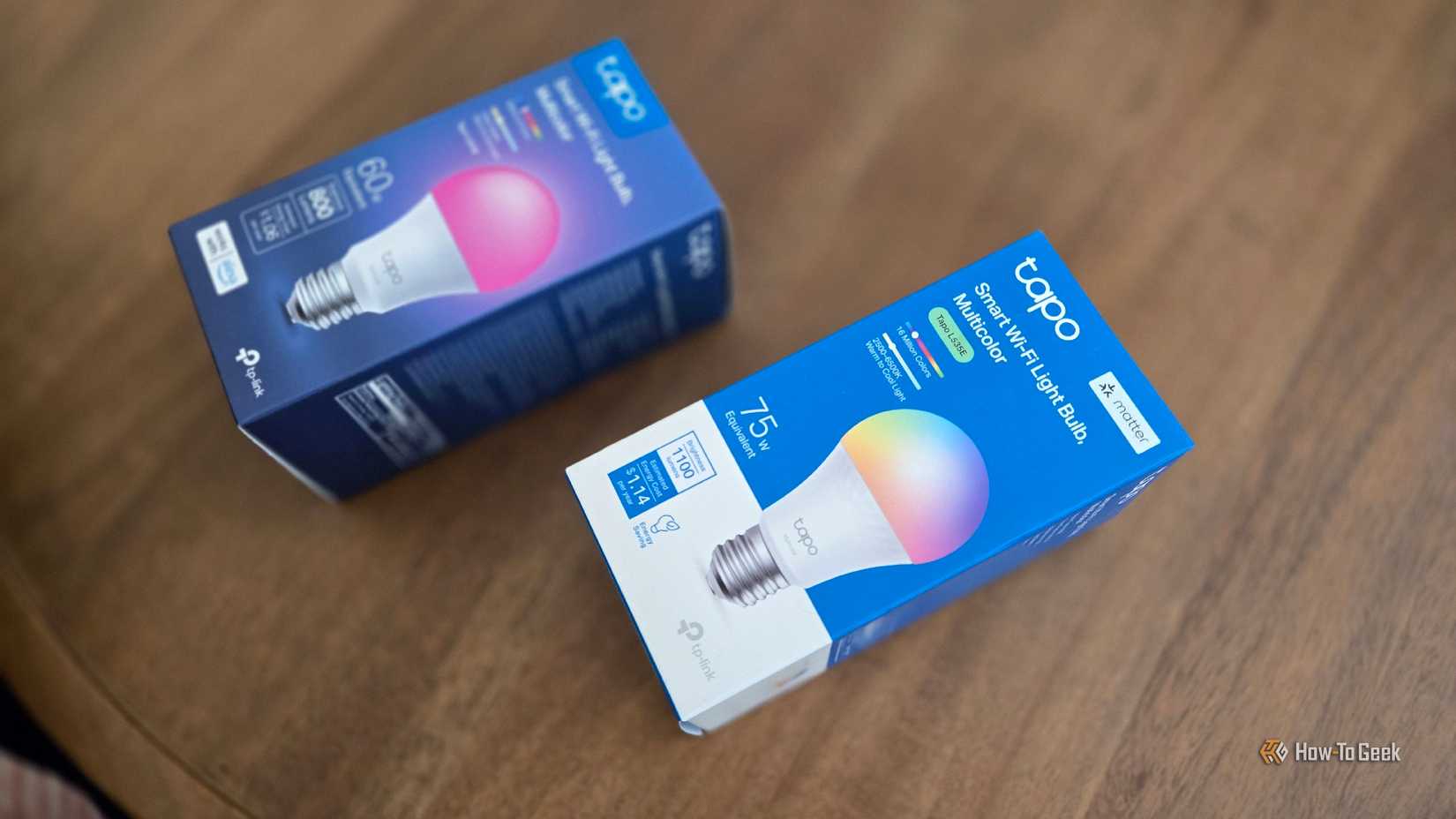 Two TP-Link Tapo smart bulbs side by side, one with Matter compatibility.