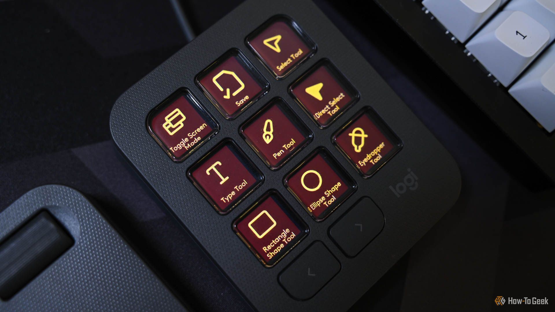 Adobe Illustrator controls open on the MX Creative Keypad.