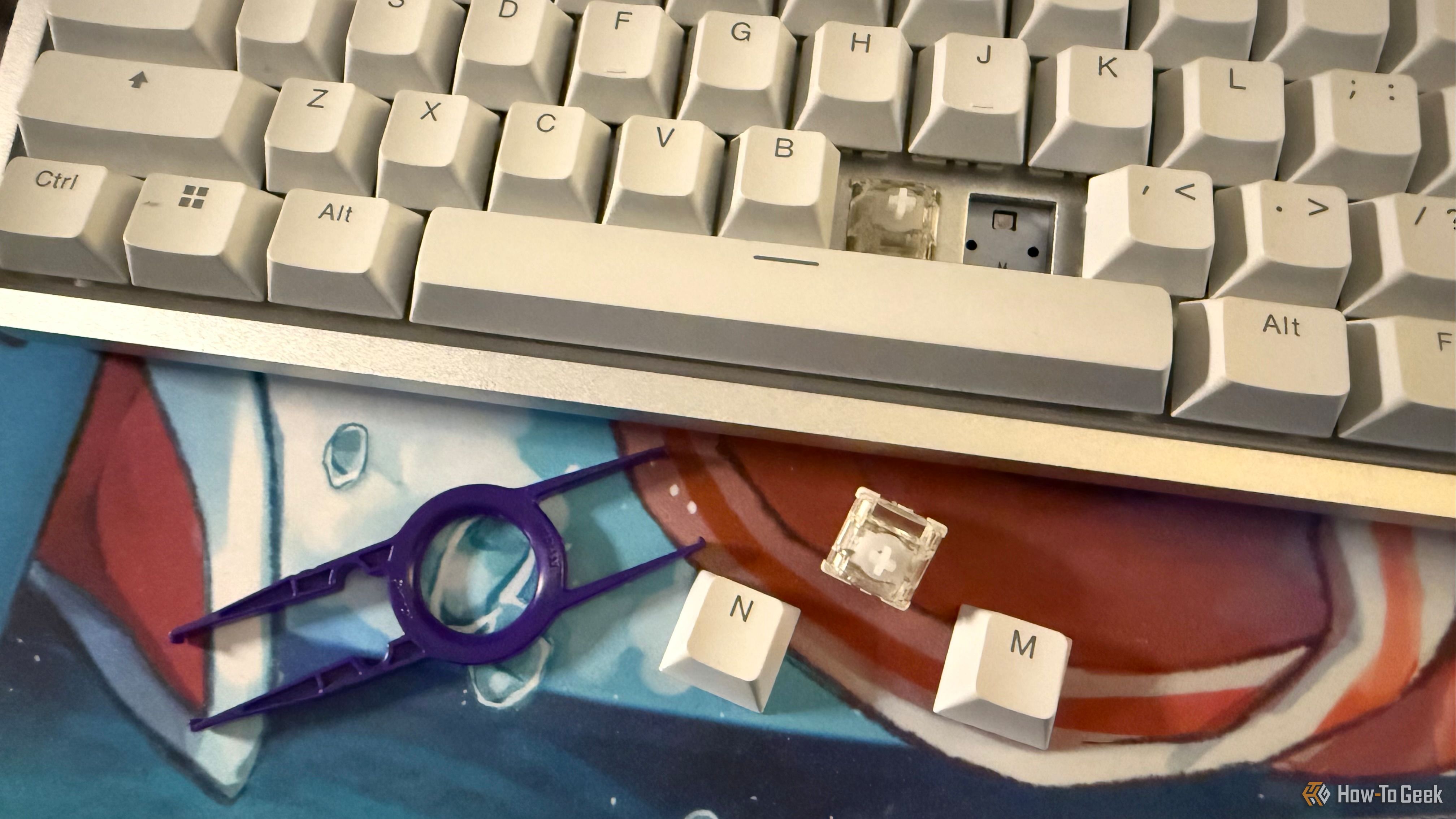 I 3D printed custom keycaps for the function row shortcuts I actually use