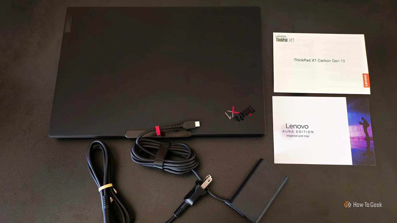 The Lenovo ThinkPad X1 Carbon Gen 13 Aura Edition's box contents.