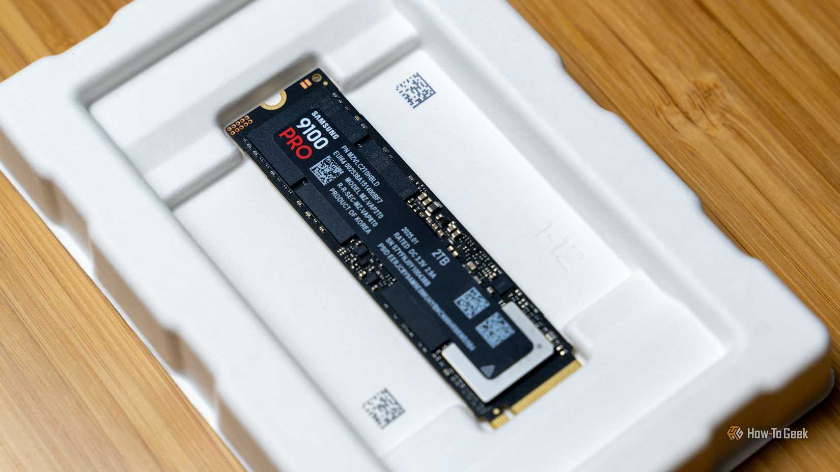 The Samsung 9100 PRO NVMe SSD sitting in its box.