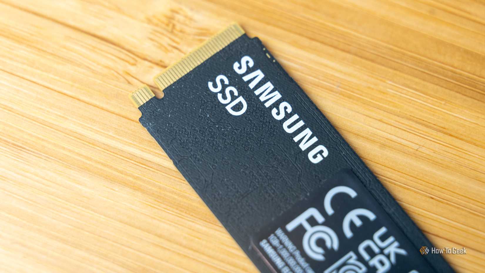 The Samsung logo on the back of the 9100 PRO NVMe SSD.