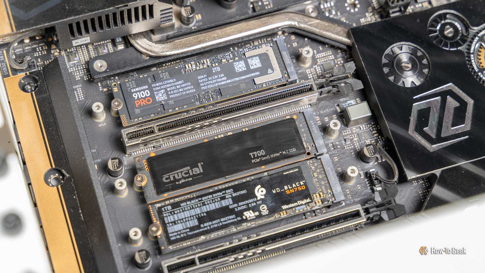 The Samsung 9100 PRO NVMe SSD installed in a motherboard with other M.2 drives.