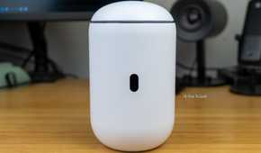 A front view of the Unifi Dream Router 7 with the screen visible but turned off.