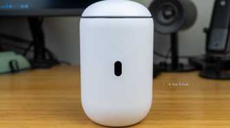 A front view of the Unifi Dream Router 7 with the screen visible but turned off.