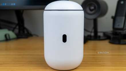 the Tesla Top rate Connectivity selection A front view of the Unifi Dream Router 7 with the screen visible but turned off.