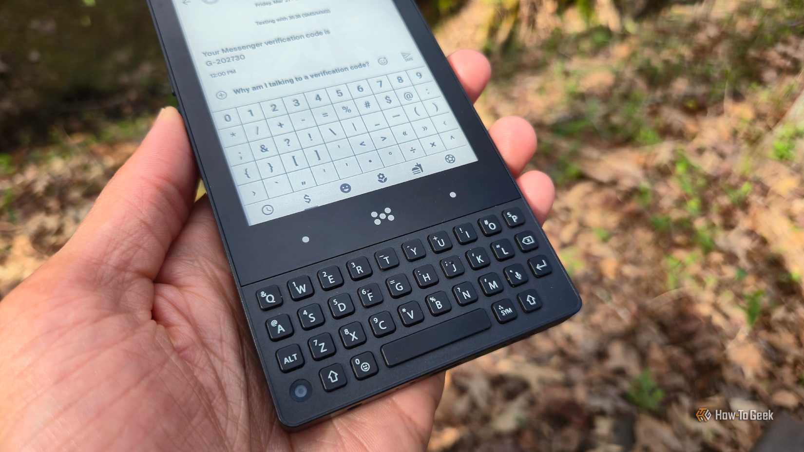 Minimal phone keyboard close-up.