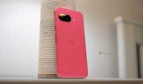 Google Pixel 9a sitting on a table showing the back of the phone.