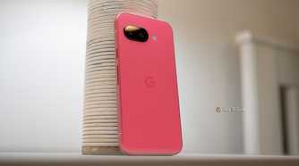 Google Pixel 9a sitting on a table showing the back of the phone.