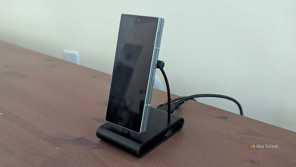 A Galaxy Z Fold 6 on a phone dock, connected to multiple peripherals through a hub