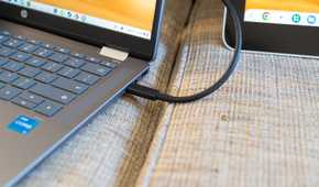 A USB-C cable connected to both a Chromebook and Wacom drawing tablet.