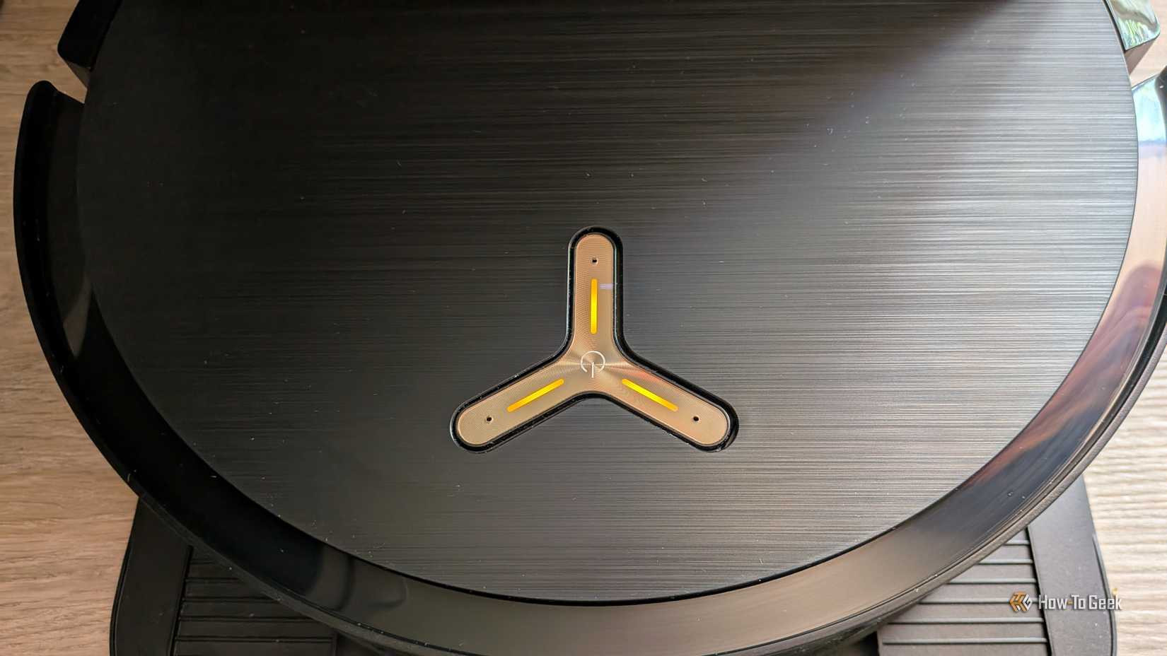 Close-up Ecovacs X9 Pro Omni on the dock.