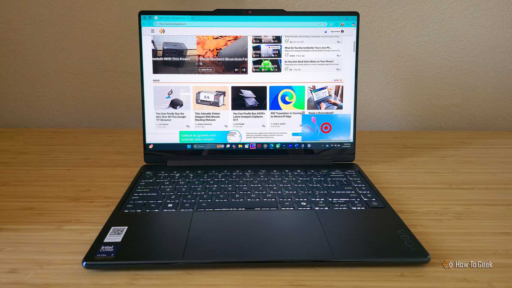 The Lenovo Yoga 9i 2-in1 Gen10 laptop open on a desk.
