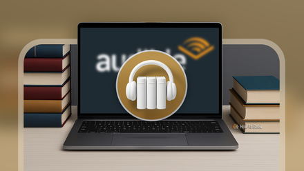 テーブルの上にノートパソコンが置かれ、その横に本が置かれています。画面には Audible のロゴがぼやけており、前景には AudioBookshelf のロゴが表示されています。