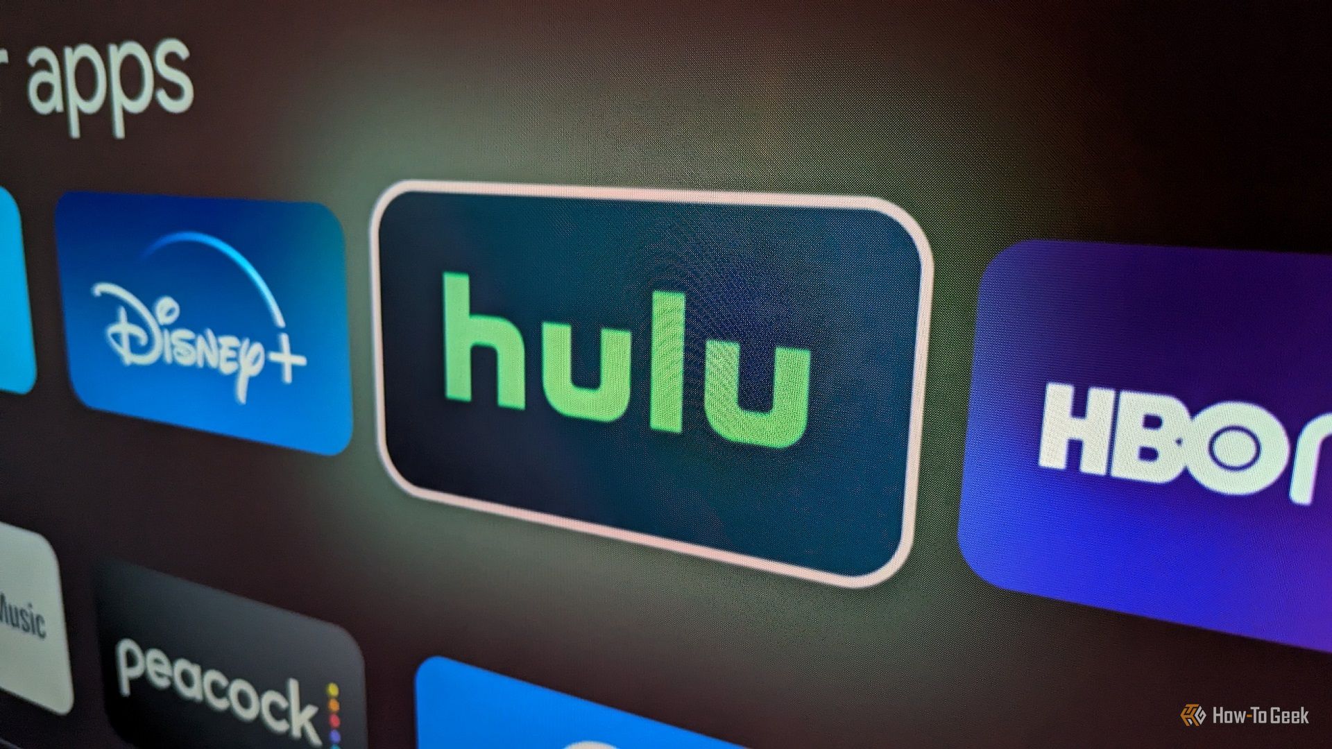 Disney+, Hulu, HBO Max, and Peacock app on a smart TV.