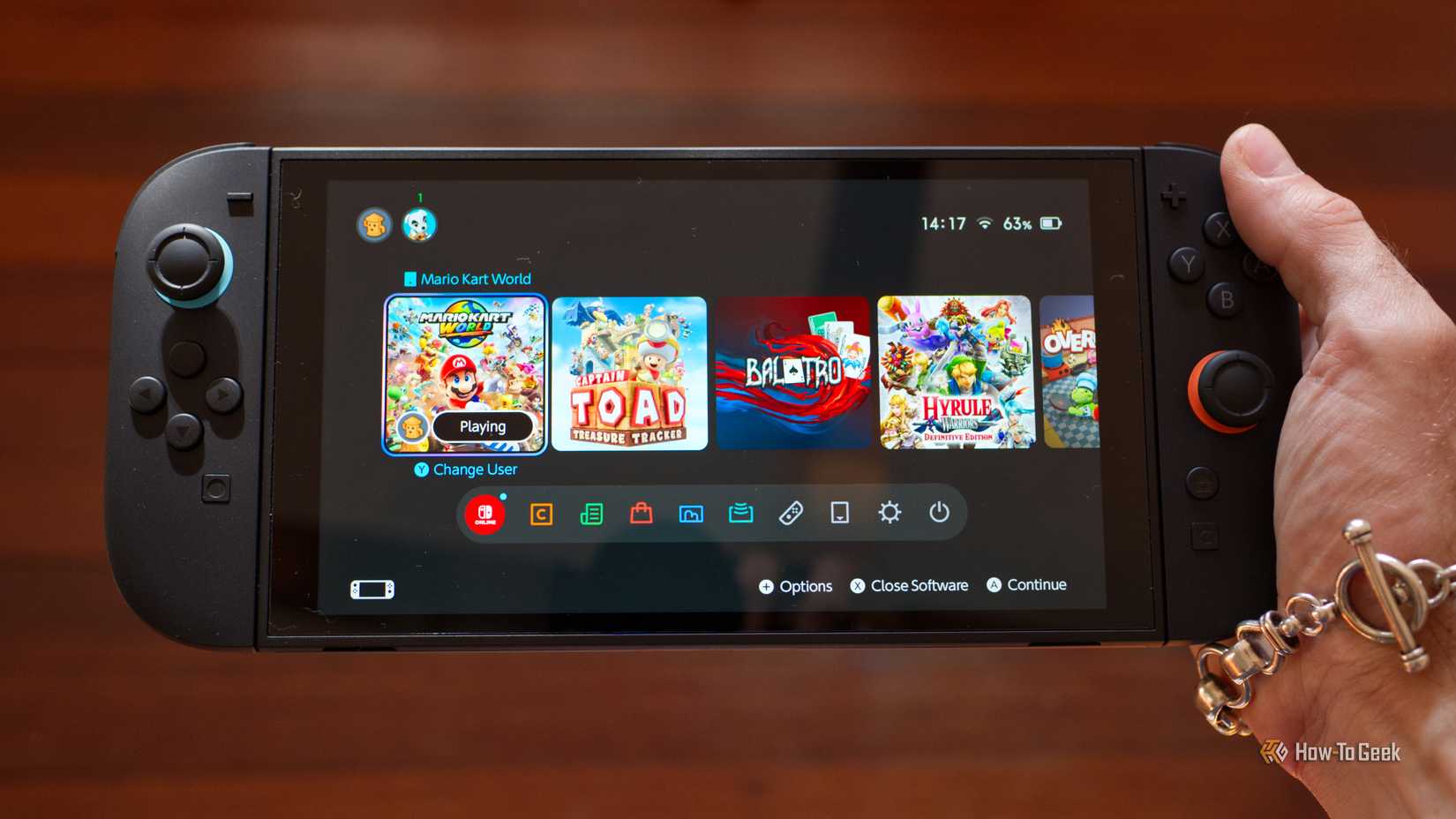 Holding a Nintendo Switch 2.