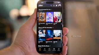 An iPhone 15 Pro in hand showing the Plex recommendations interface.