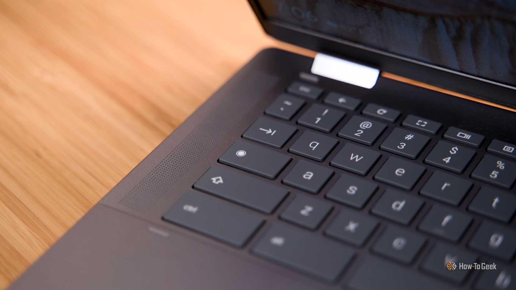 Chromebook keyboard with search button in the center.