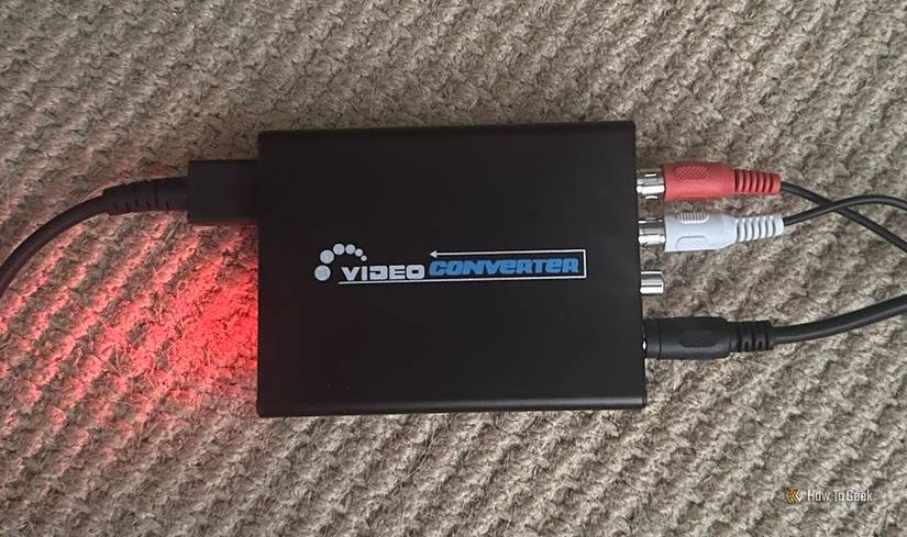 An HDMI to S-Video converter box.