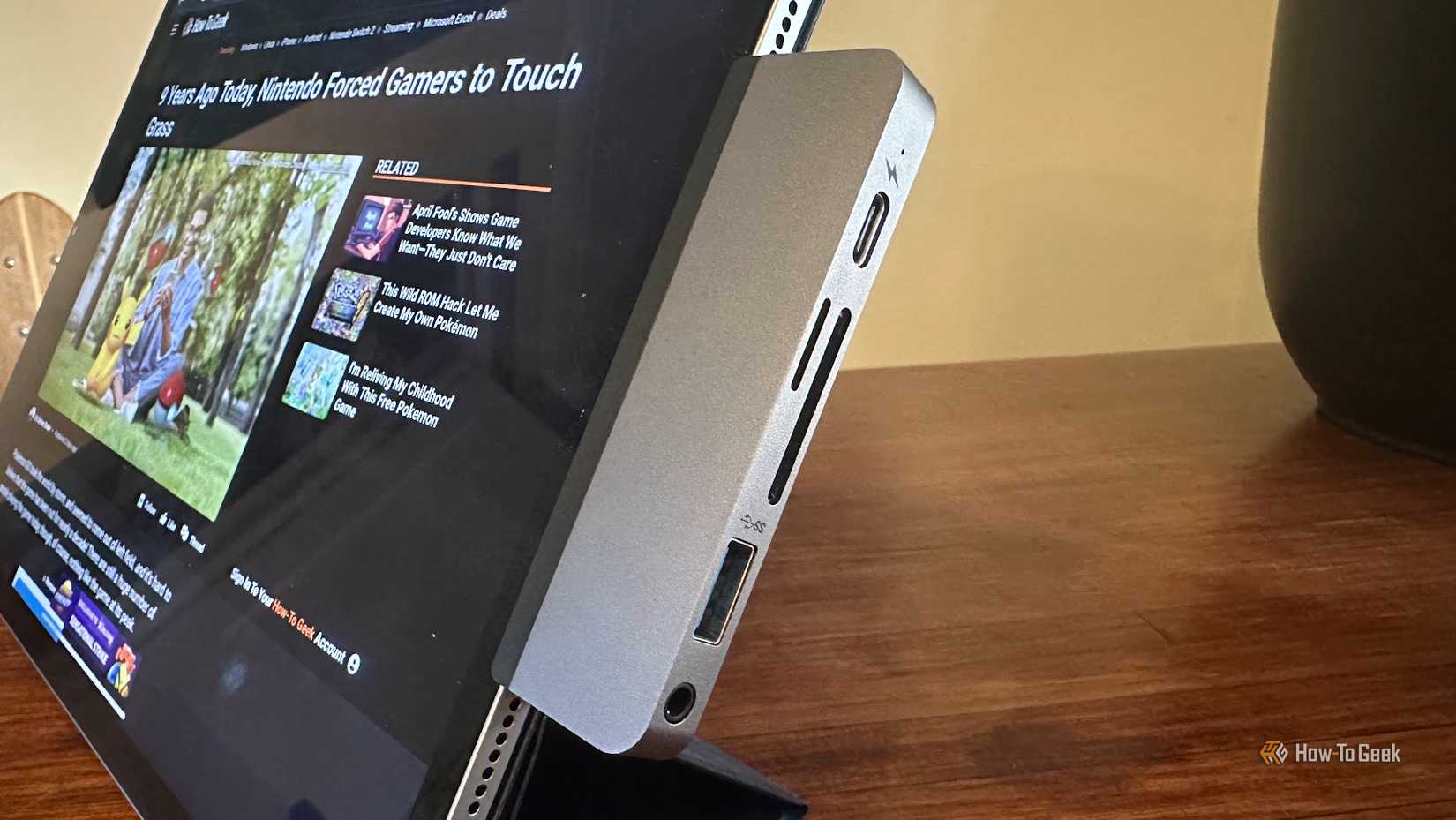 An iPad with a hyperdrive attachment.