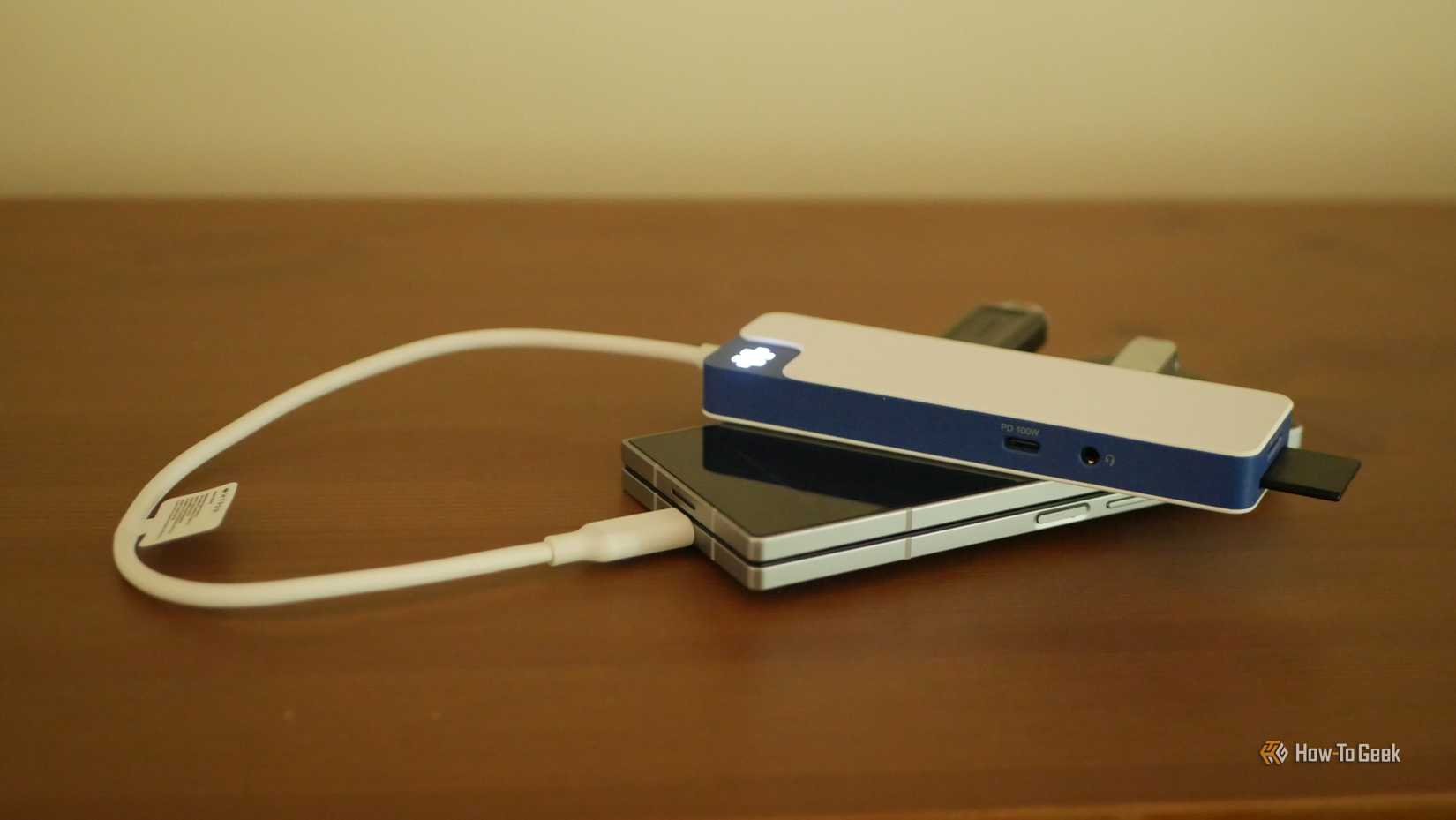 The Hyper HyperDrive Flex USB-C hub on top of a Galaxy Z Fold 6-1
