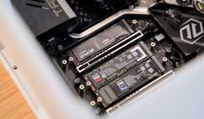 The Crucial T710, Samsung 9100 Pro, and Samsung 990 EVO Plus NVMe SSDs installed in a gaming desktop.