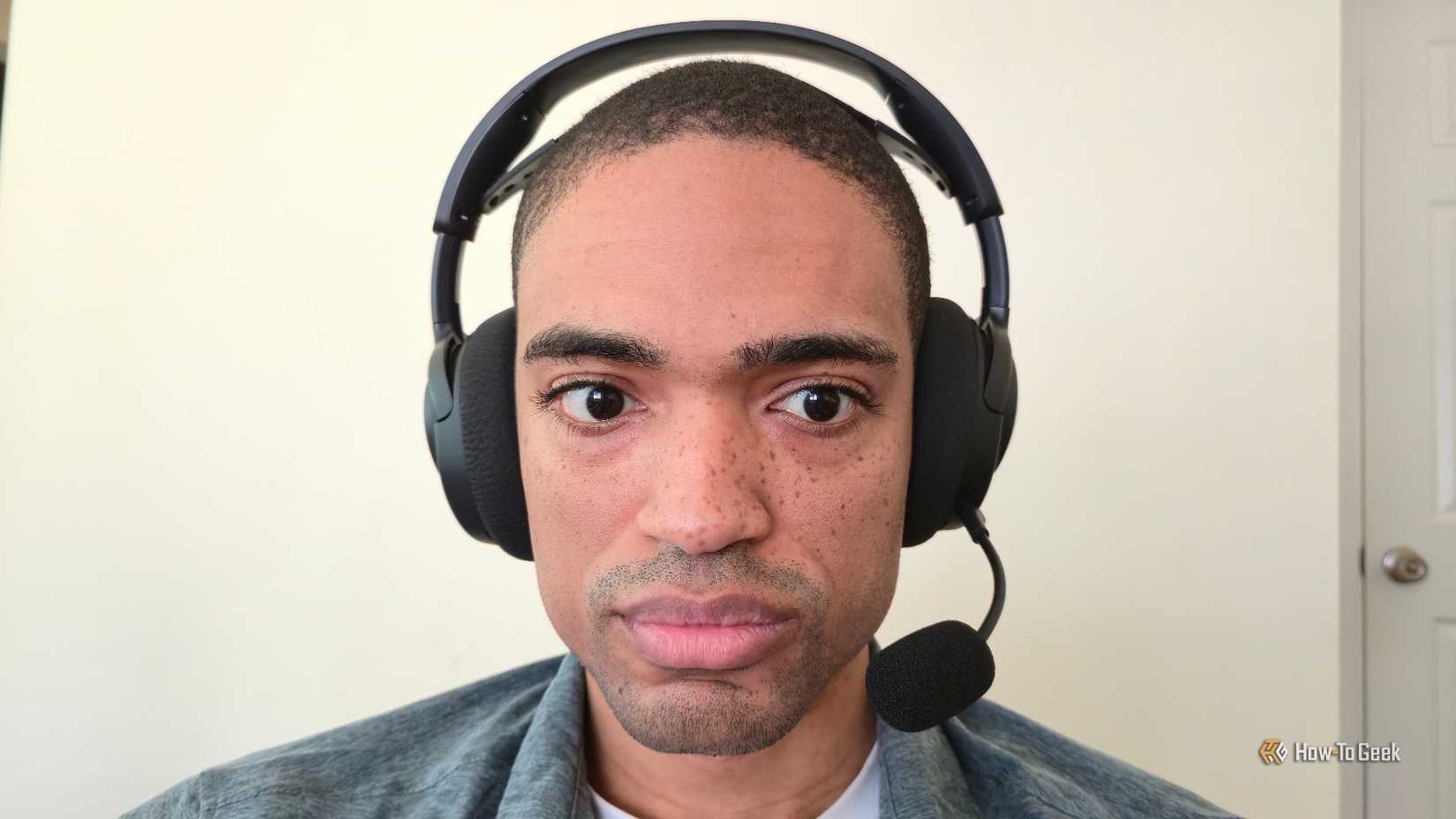 Person wearing SteelSeries Arctis Nova 3X Bluetooth headphones