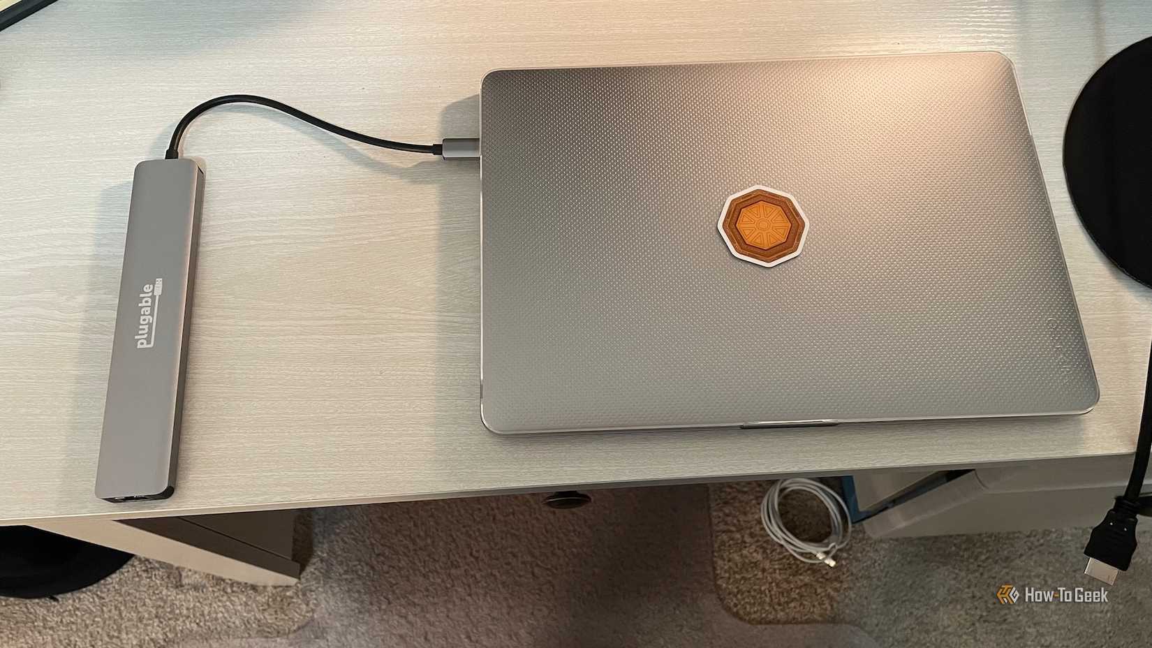 The Plugable 9-in-1 USB-C Hub connected to a laptop.